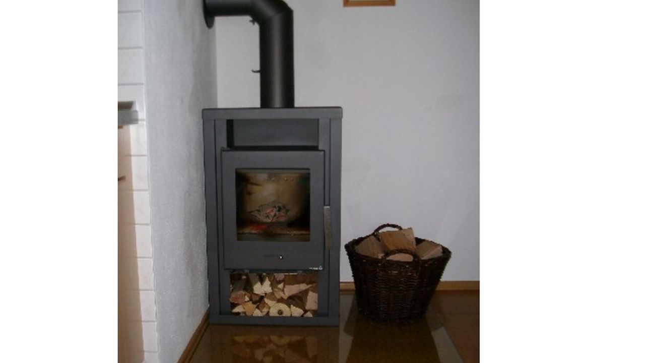 Kaminofen in der Wohnung "Hörndlwand" Kaminofen in der Wohnung "Hörndlwand"